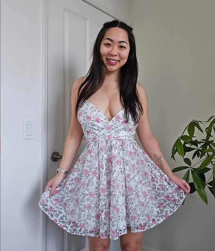 Amateur custom video creator Ashley Aoki in a floral dress
