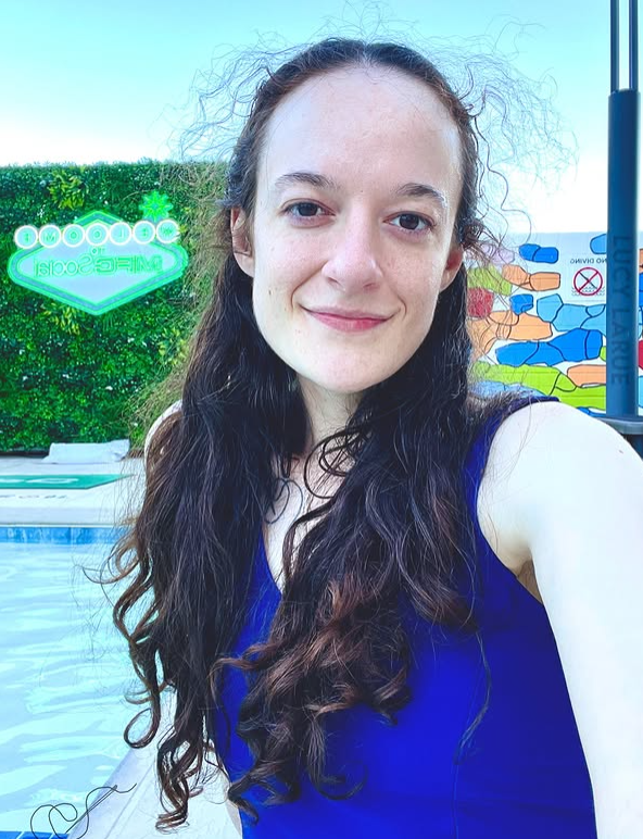 Indie porn creator Lucy LaRue in a blue top